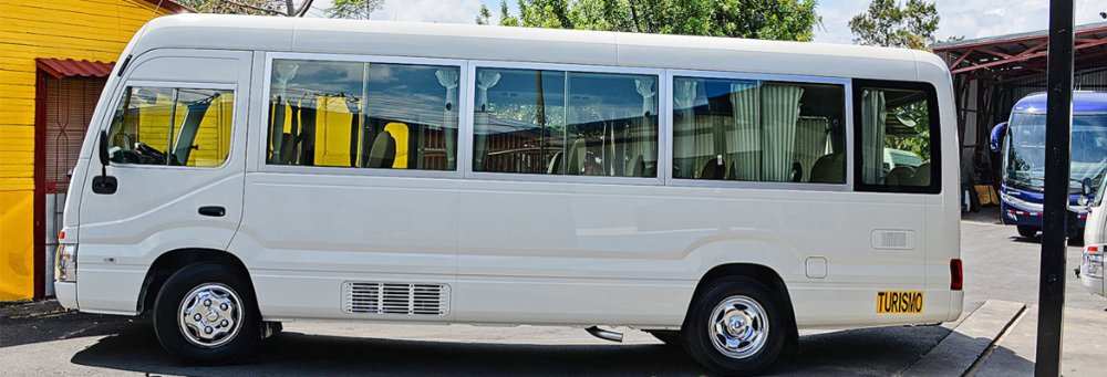  passenger coaster van lateral view leading image
 - Costa Rica